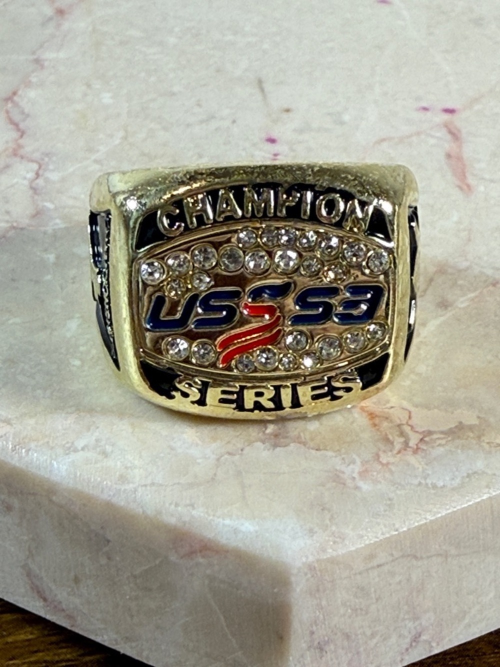 Champion Series Gold-Tone Ring with Crystal Accents